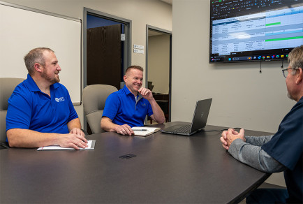 Panel Shop Team Discussing Workload